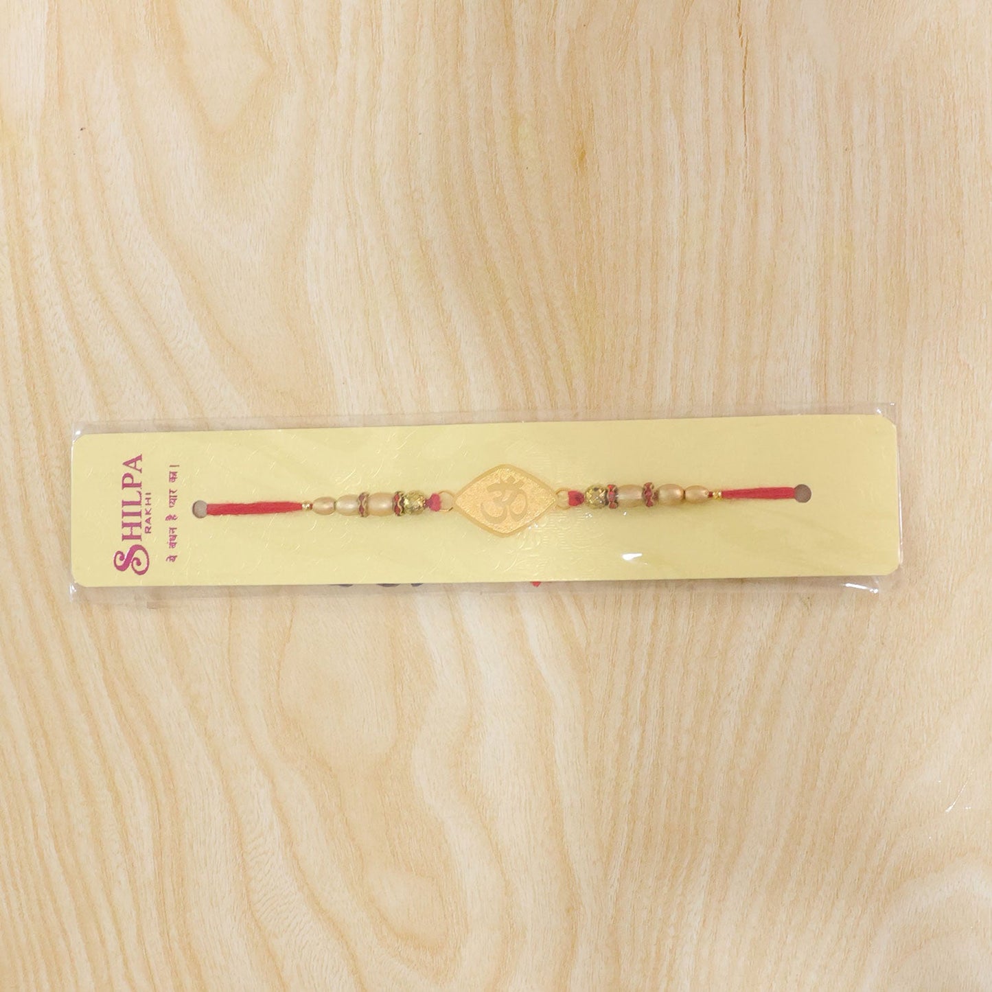 Om Symbol Shape Beaded Designer Rakhi for Brother