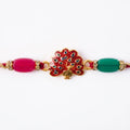 Peacock Charm Rakhi for Brother – Beaded Designer Traditional