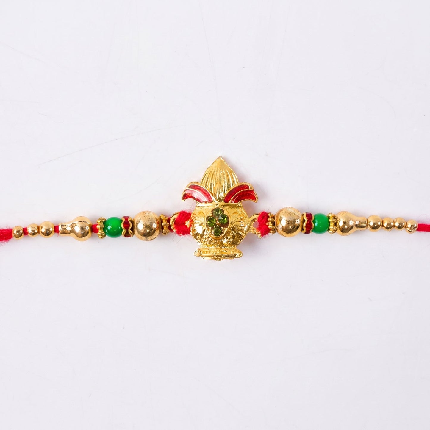 Traditional Golden Kalash Motif Rakhi with Beadwork Rakhi for Brother