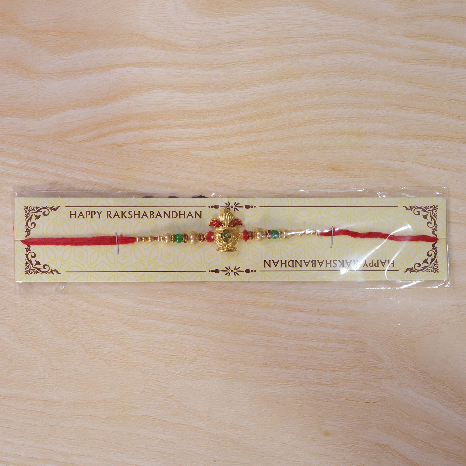Traditional Golden Kalash Motif Rakhi with Beadwork Rakhi for Brother