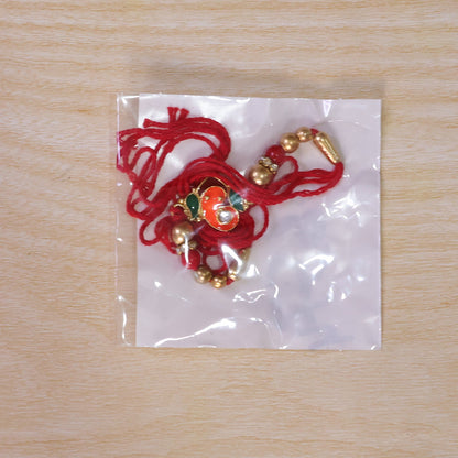 Ganesha Rakhi presented for Raksha Bandhan gifting.