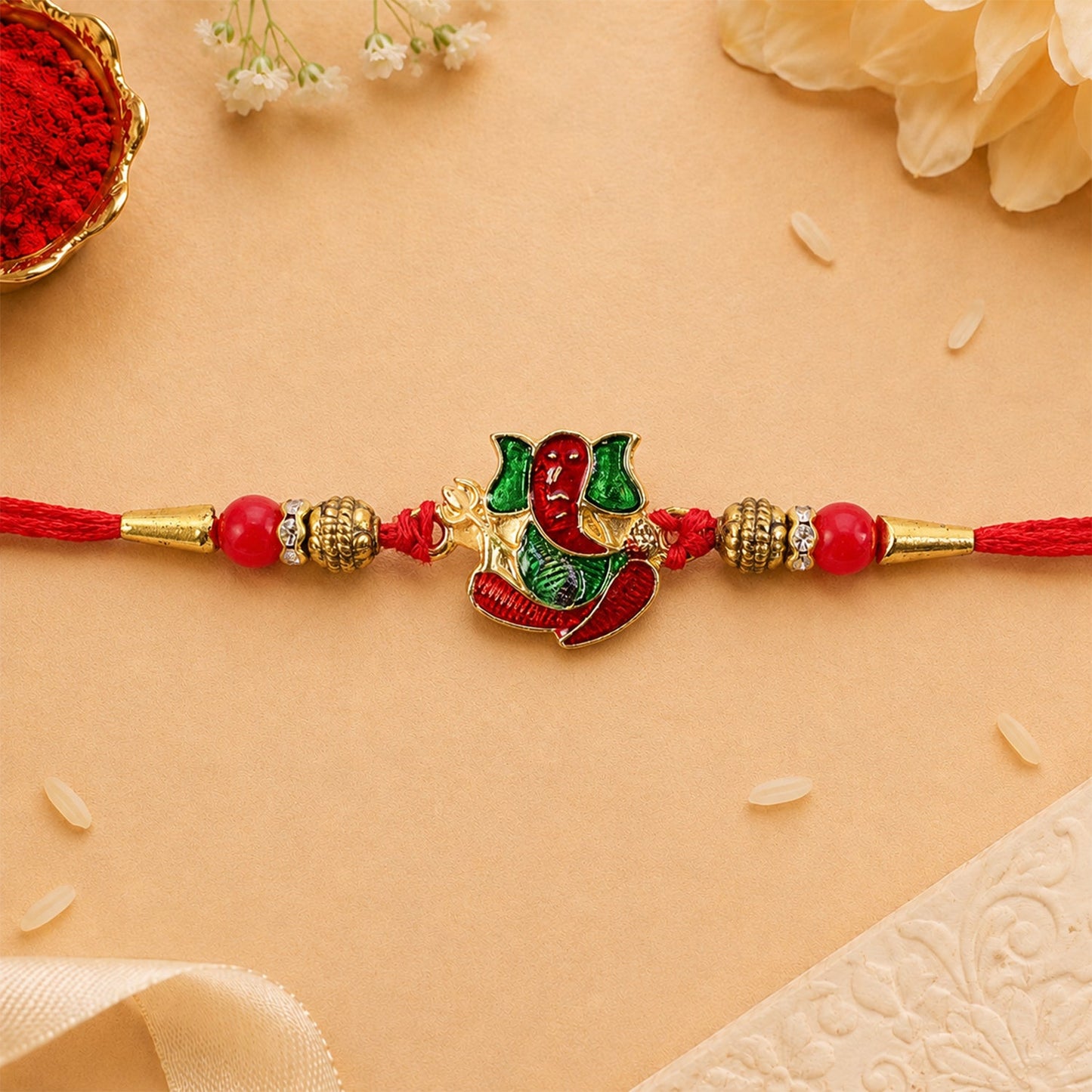 Divine Ganesha Meenakari Rakhi with Beads Rakhi for Brother