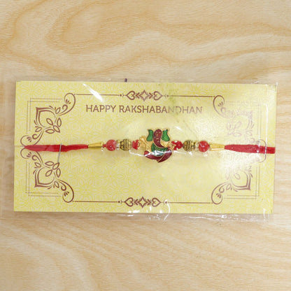 Divine Ganesha Meenakari Rakhi with Beads Rakhi for Brother