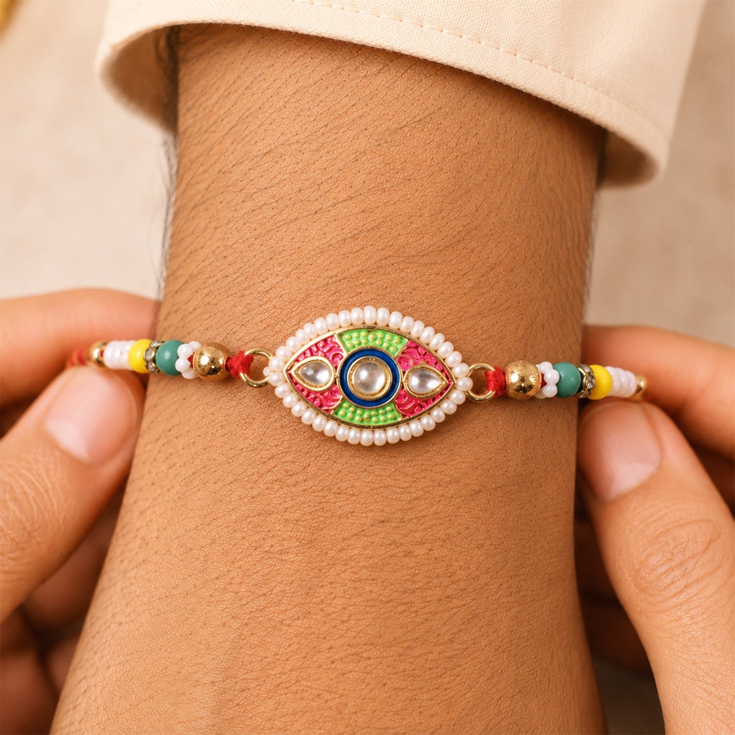 Designer Kundan Meenakari Rakhi with Pearl Border – Rakhi for Brother