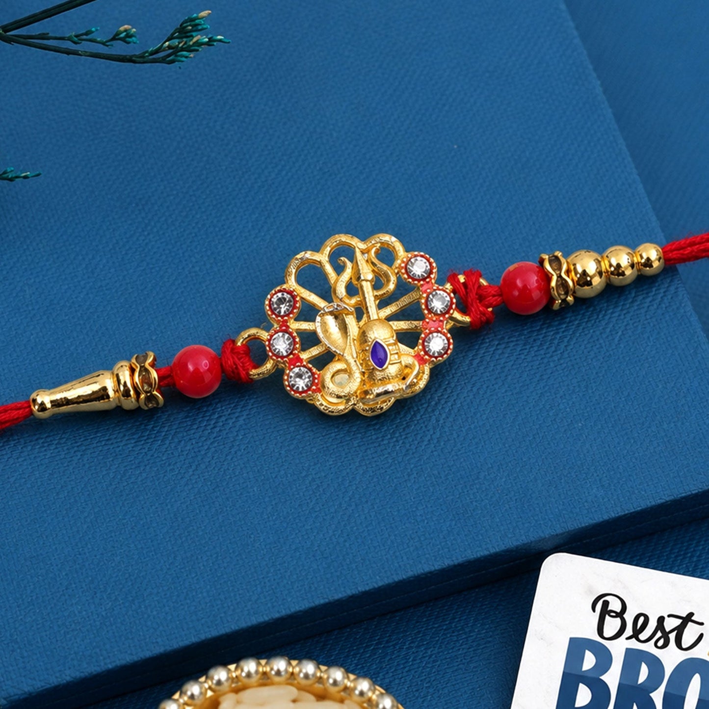 Divine Shiv Trishul Rakhi with Crystal Stones Rakhi for Brother