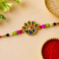 Peacock Motif Rakhi for Brother – Stone Studded Designer Thread