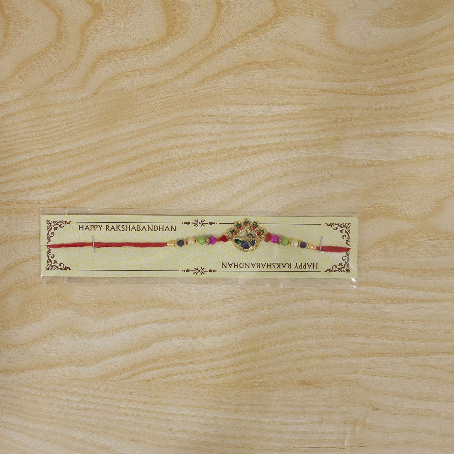 Peacock Motif Stone Studded Designer Rakhi for Brother