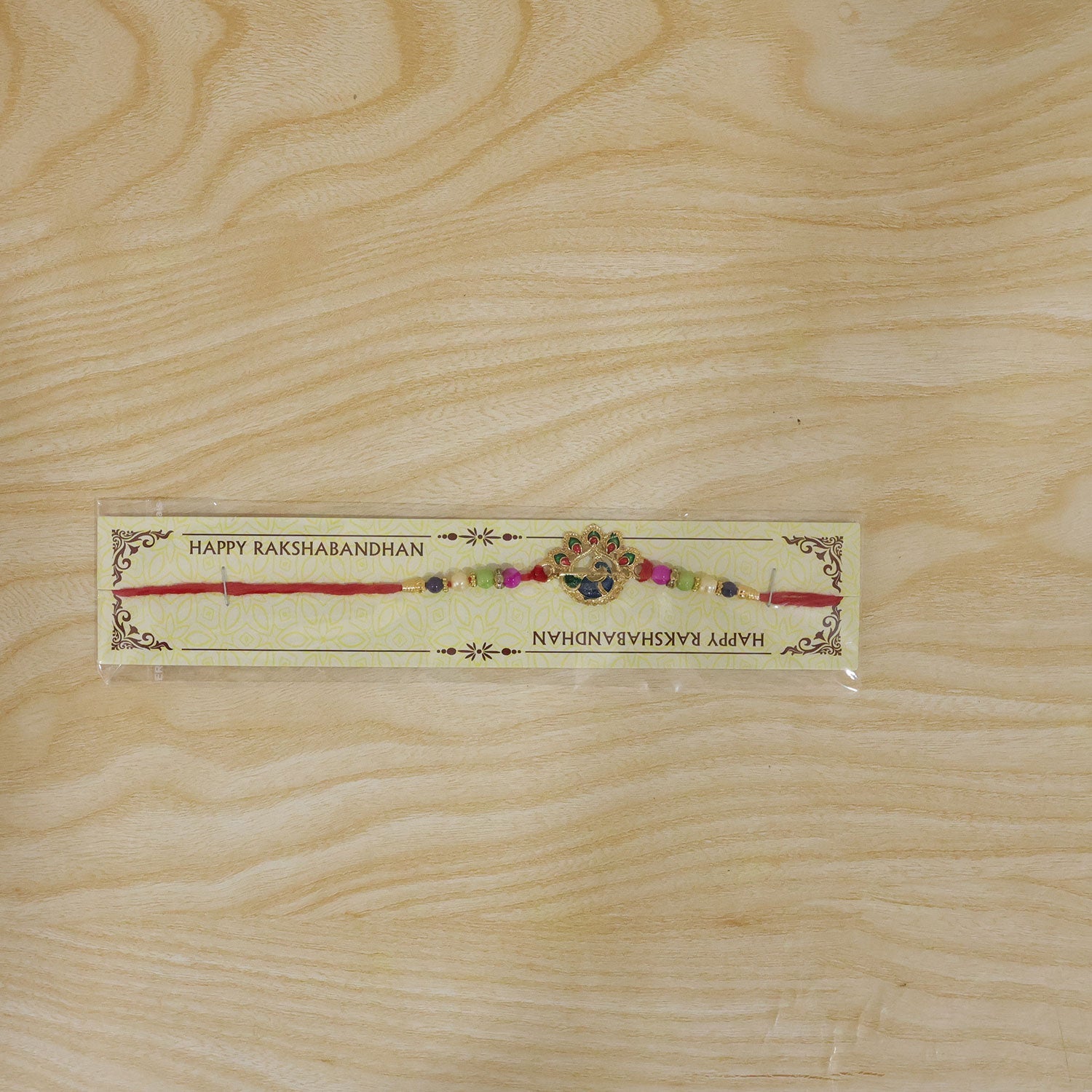 Peacock Motif Stone Studded Designer Rakhi for Brother