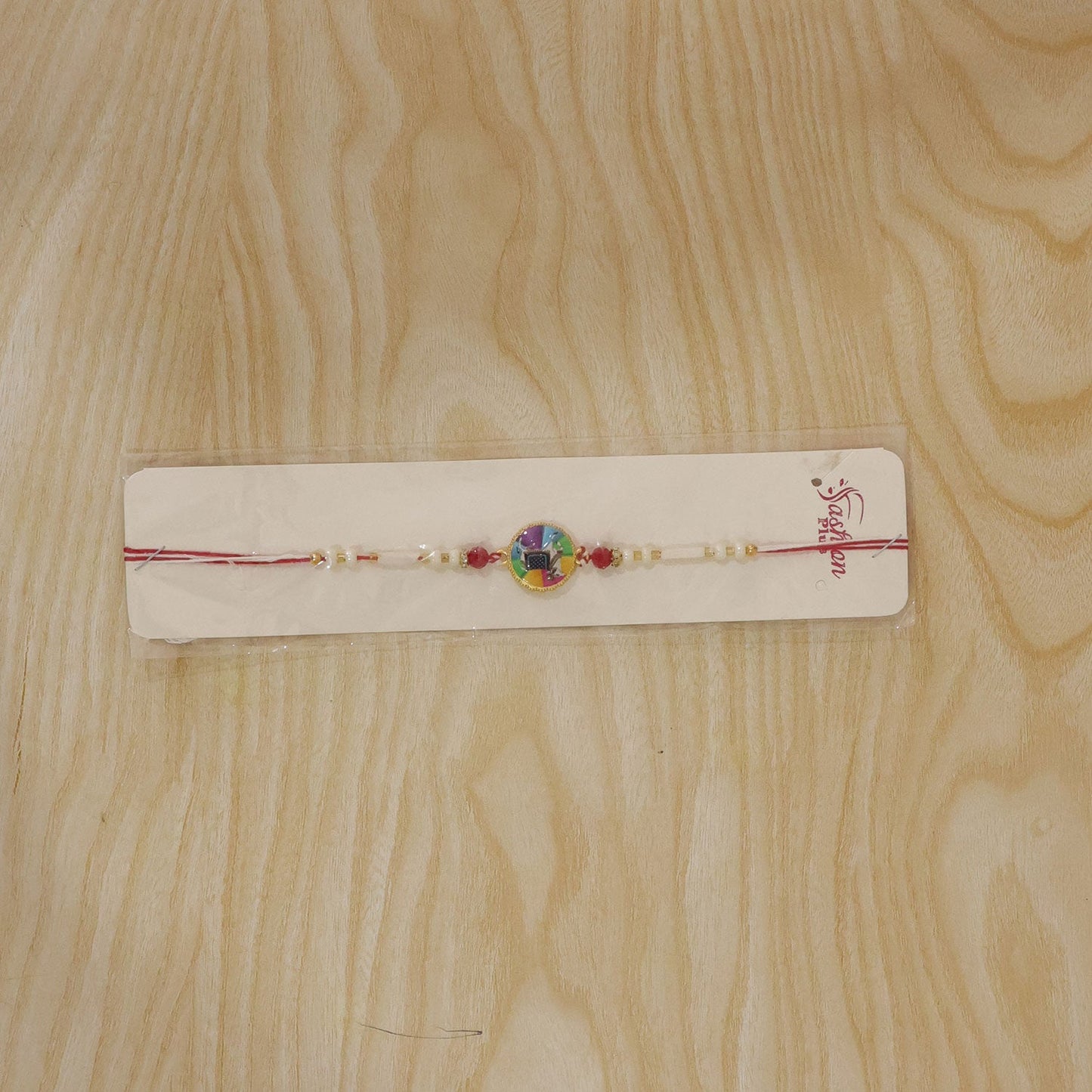 Divine Nandi Motif Beaded Rakhi  Rakhi for Brother