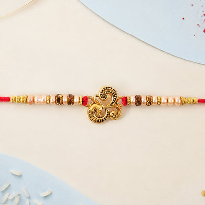 Traditional Om Antique Rakhi with Pearl Beads – Rakhi for Brother