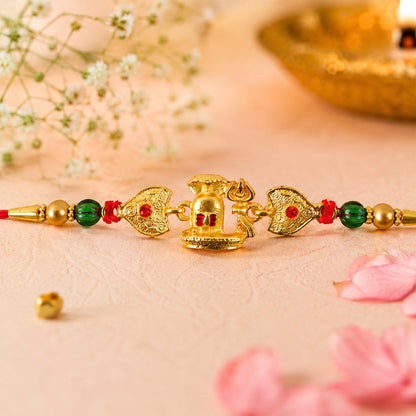 Religious Shivling Trishul Rakhi with Beadwork – Rakhi for Brother