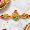 Shri Motif Rakhi for Brother – Golden Enamel Floral Work