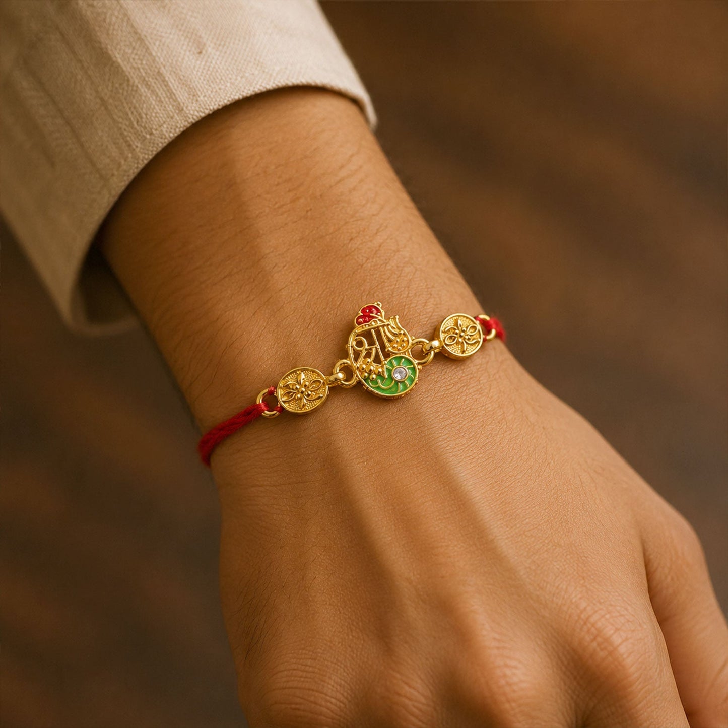 Golden Shri Motif Rakhi with Enamel & Floral Work Rakhi for Brother