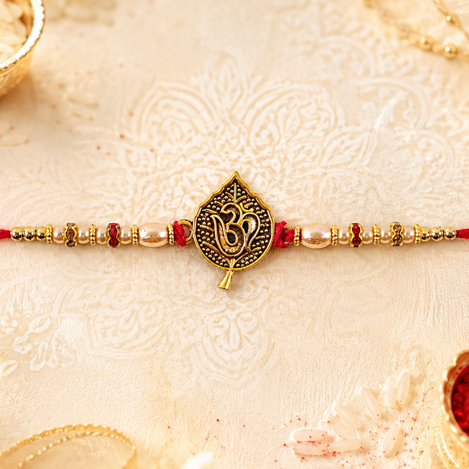 Leaf Shape Om Motif Premium Beaded Designer Rakhi for Brother