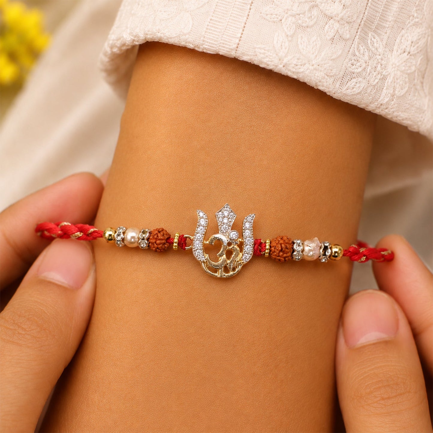 Auspicious Trishul Om Diamond Rakhi with Pearls – Rakhi for Brother