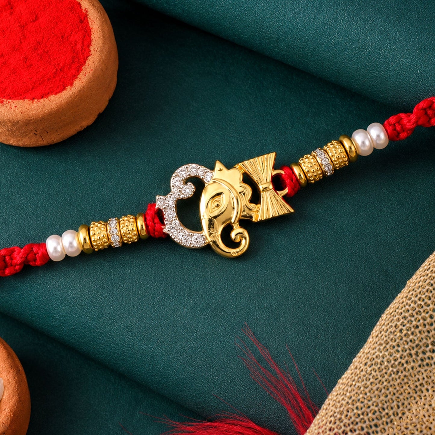 Religious Ganpati Diamond Rakhi with Pearl Beads Rakhi for Brother