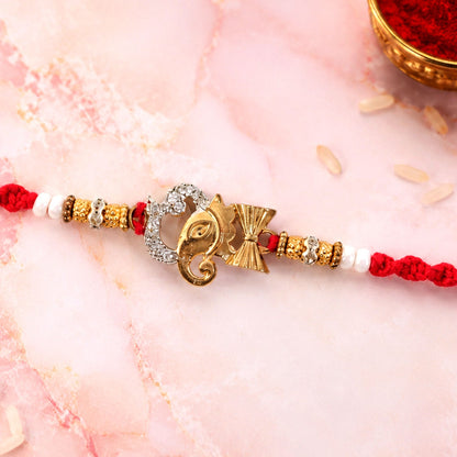 Religious Ganpati Diamond Rakhi with Pearl Beads Rakhi for Brother