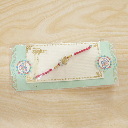 Religious Ganpati Diamond Rakhi with Pearl Beads Rakhi for Brother