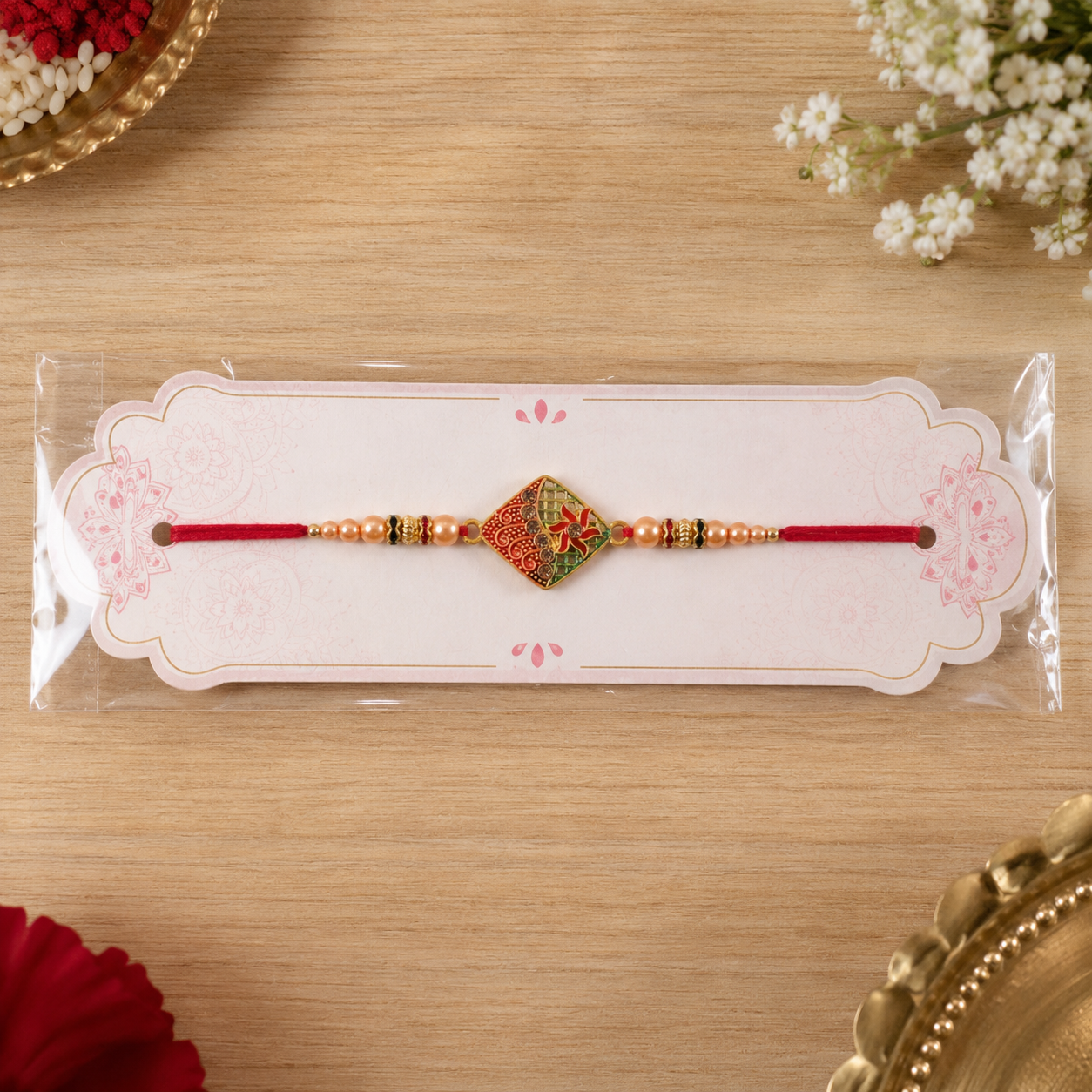Designer Enamel Diamond Rakhi with Pearl Beadwork – Rakhi for Brother