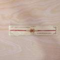 Ruby Flower Pearl Bracelet Rakhi – Festive Gift for Brother