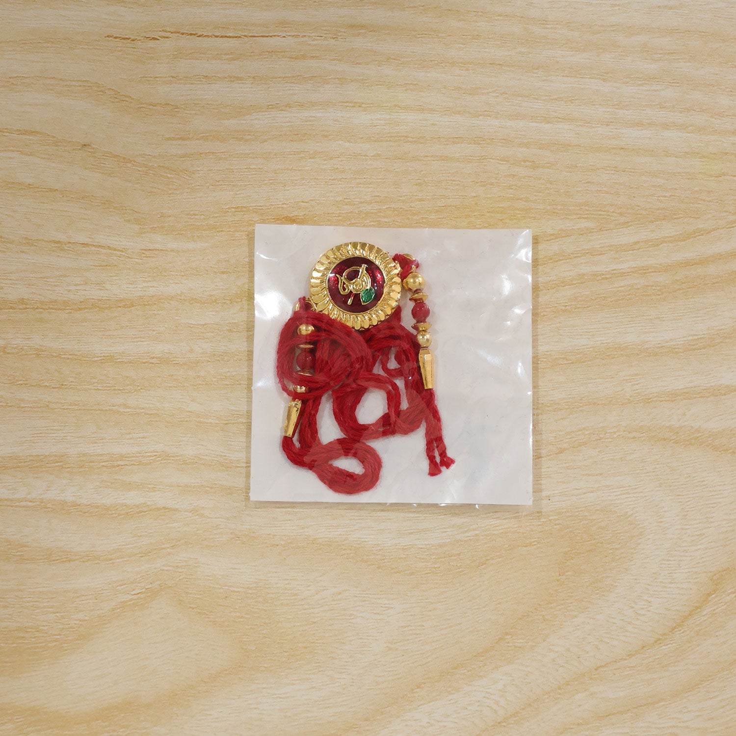 Divine Om Round Rakhi with Meenakari & Beads Rakhi for Brother