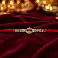 Stone Bracelet Rakhi – Golden Diamond Design for Brother