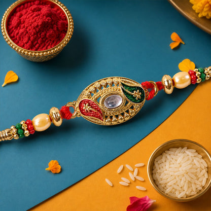 Golden Kundan Oval Rakhi with Meenakari & Pearls – Rakhi for Brother