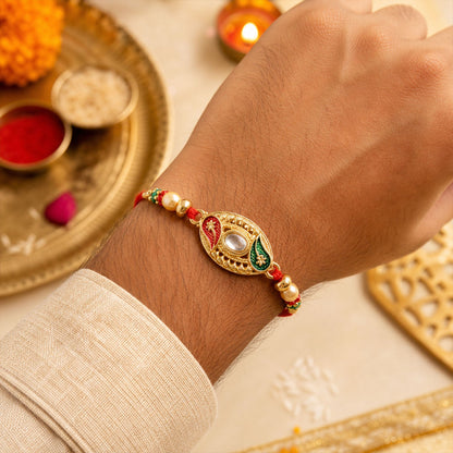 Golden Kundan Oval Rakhi with Meenakari & Pearls – Rakhi for Brother