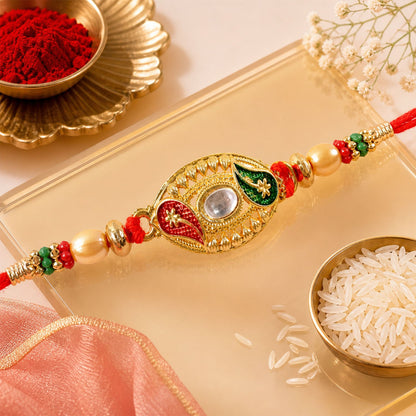 Golden Kundan Oval Rakhi with Meenakari & Pearls – Rakhi for Brother
