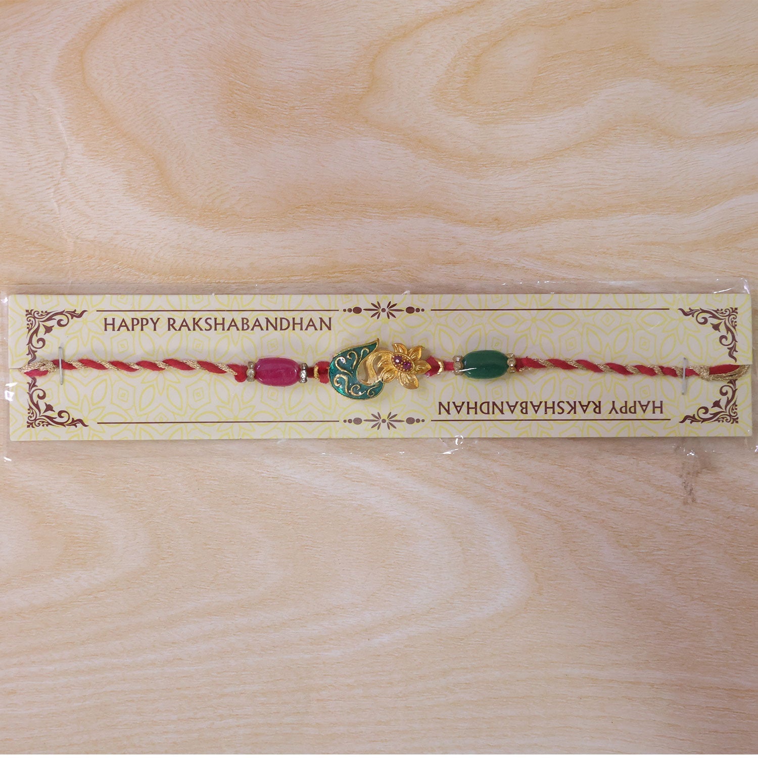 Golden Paisley Meenakari Rakhi with Stones & Beads – Rakhi for Brother