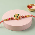 Ganesha Rakhi – Red Beads Stone Studded for Brother