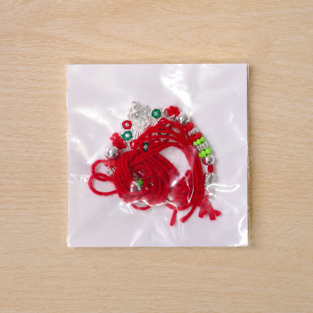 Traditional Ganesha Rakhi with Beadwork – Rakhi for Brother