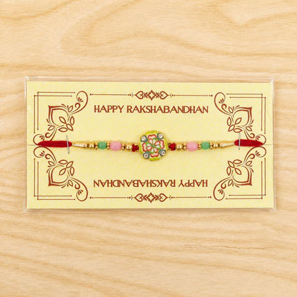 Designer Rakhi for Brother – Floral Clover Charm Beaded