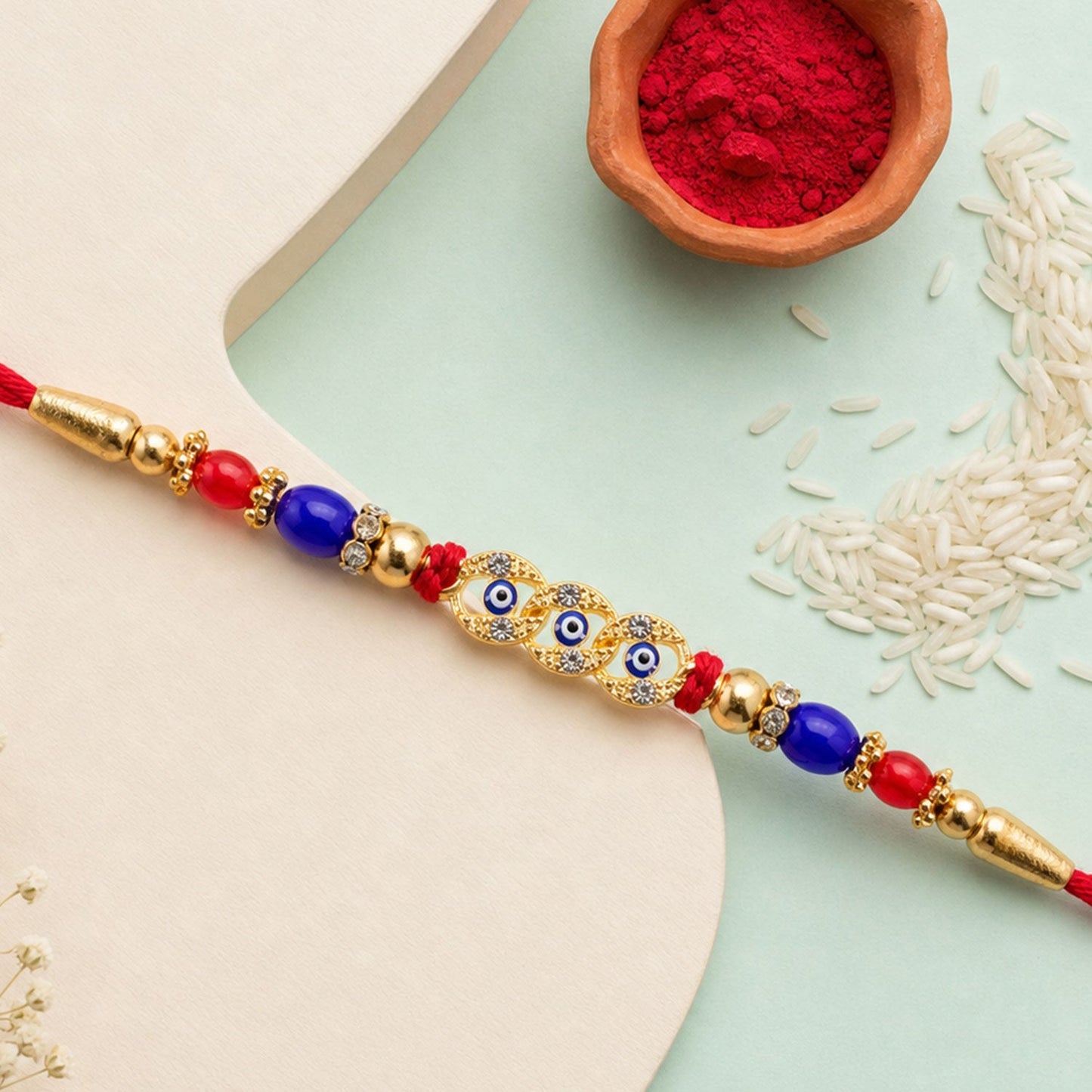Designer Evil Eye Motif Rakhi with Stone & Beadwork Rakhi for Brother