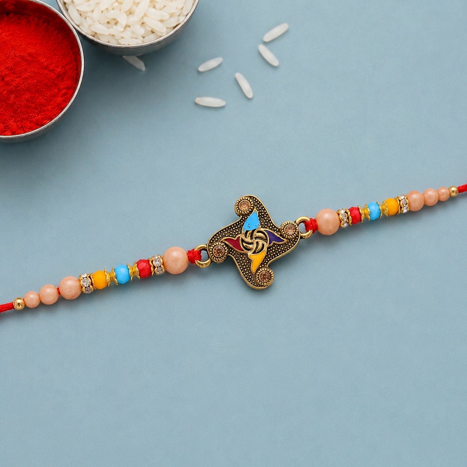 Golden Antique Meenakari Rakhi with Stones & Pearls – Rakhi for Brother