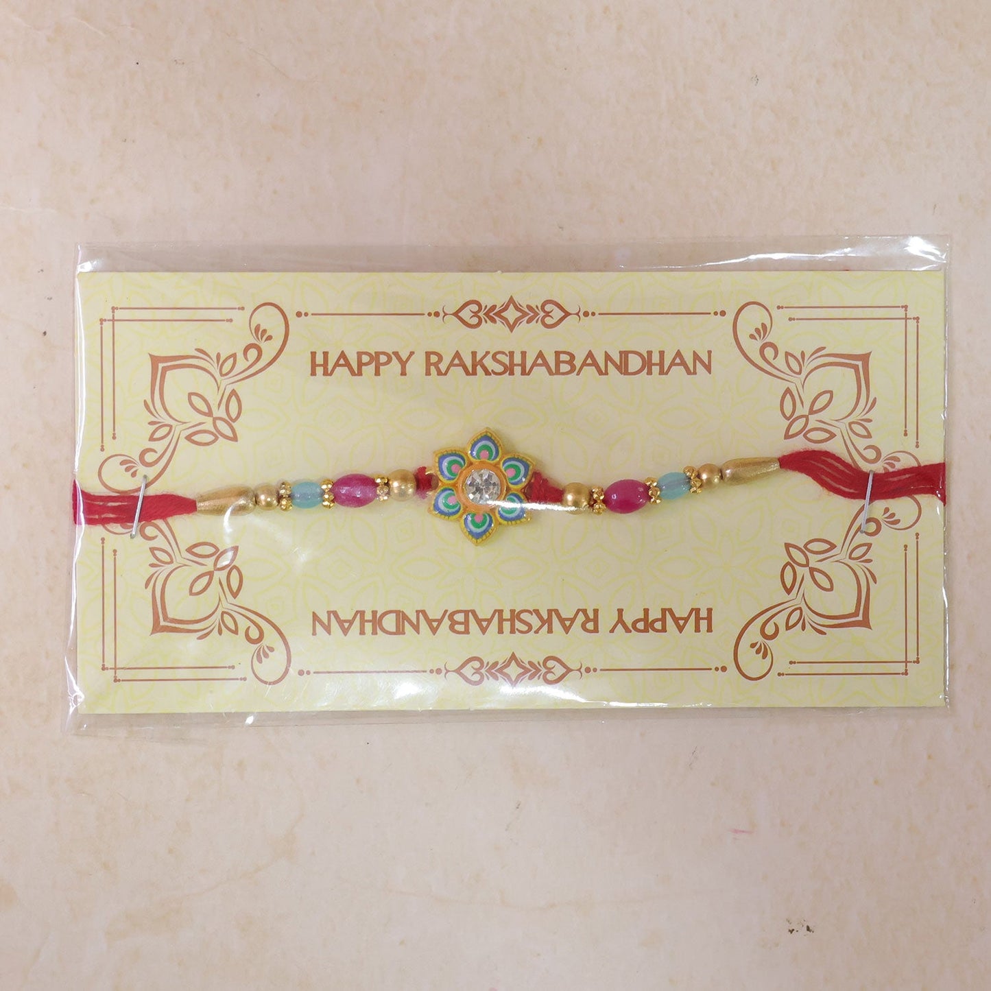 Meenakari Floral Morpankh theme Crystal Golden Beads Rakhi for Brother