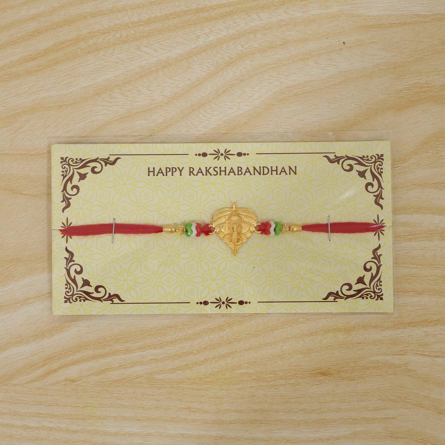 Golden Ganesh Paan Leaf Multicolor Beads Traditional Rakhi