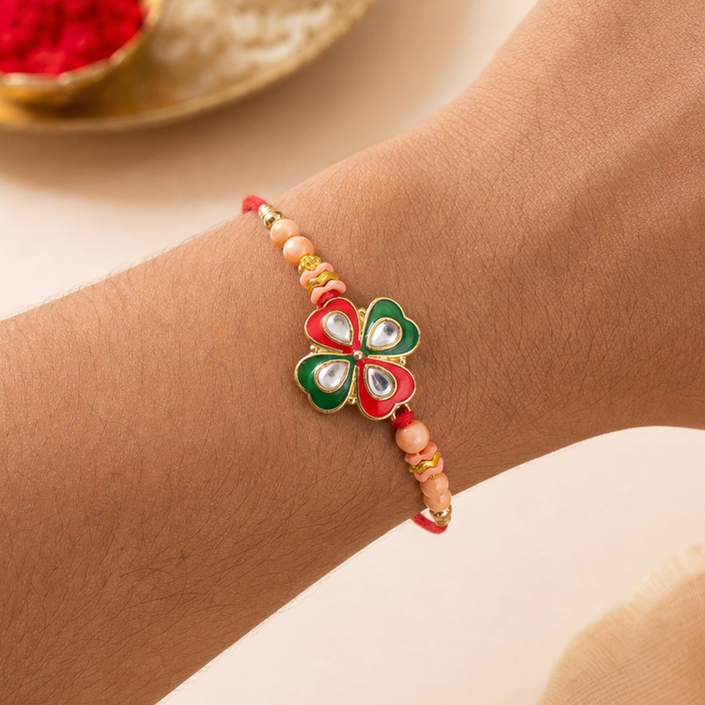 Traditional Floral Designer Rakhi with Kundan Centerpiece