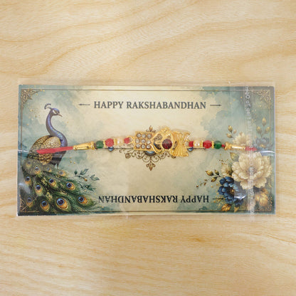 Designer Om Damaru Rakhi with Elegant Stone Pendant