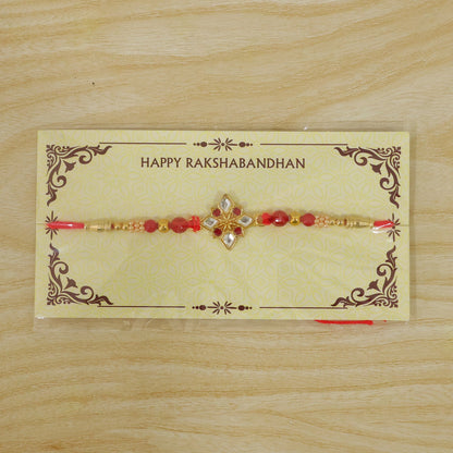 Designer Golden Ganesha Rakhi with Red & Green Beads for Brother | Raksha Bandhan Special