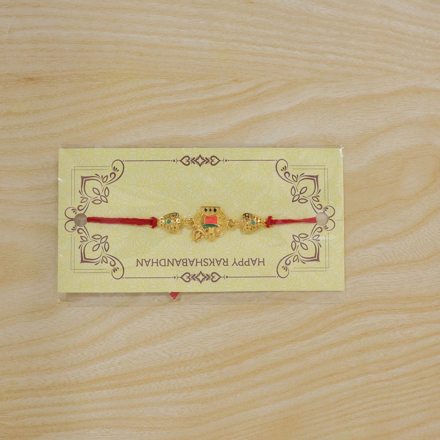 Stylish Golden Om Rakhi with Red Thread for Brother | Divine Rakshabandhan Rakhi
