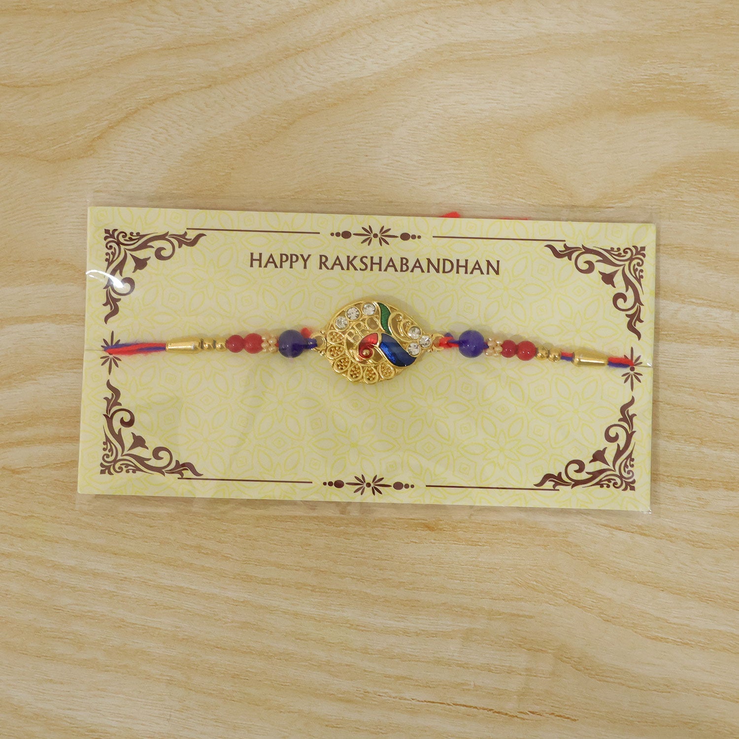 Classic Golden Designer Rakhi with Red Stone for Brother | Traditional Rakhi