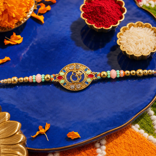 Round Om Designer Rakhi with Pearl Beaded Festive Detail
