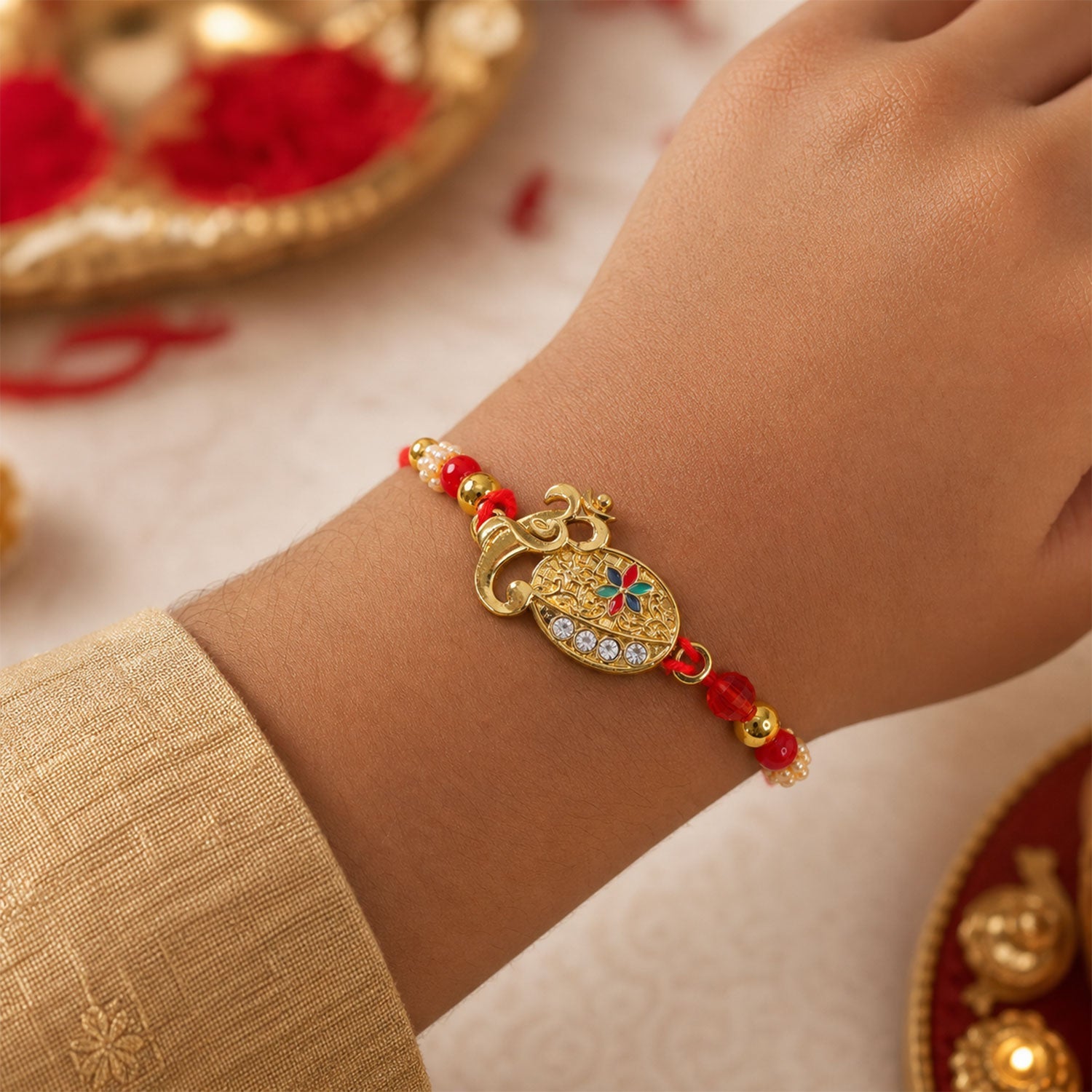 Stylish Om Shape Kundan Designer Rakhi with Beaded Festive Detail