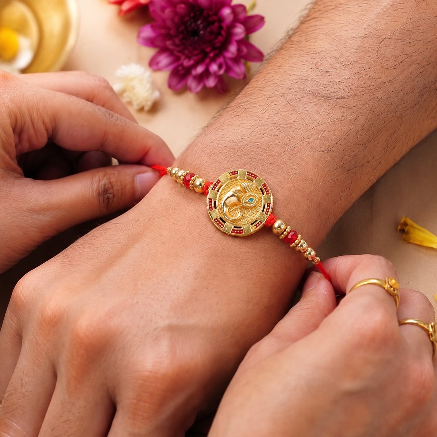 Round Ganesha Kundan Designer Rakhi with Beaded Festive Detail Pattern