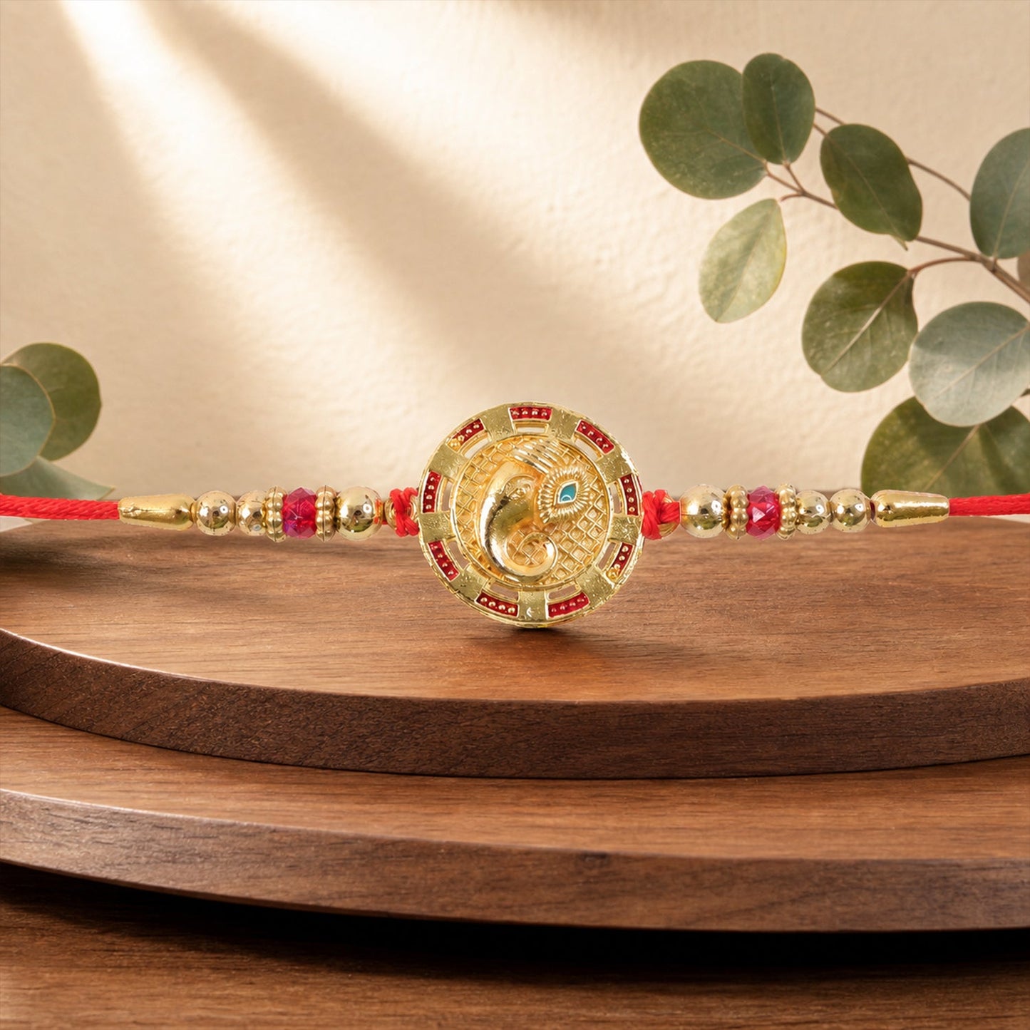 Round Ganesha Kundan Designer Rakhi with Beaded Festive Detail Pattern