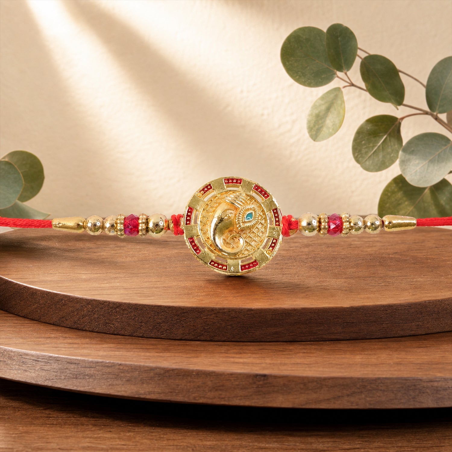 Round Ganesha Kundan Designer Rakhi with Beaded Festive Detail Pattern