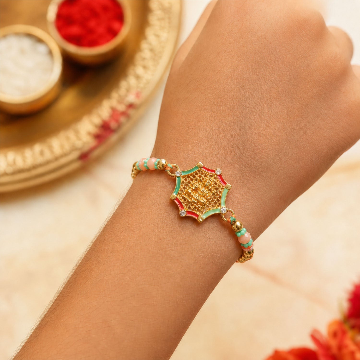 Star Shape Ganesha Designer Rakhi with Beaded Festive Detailing
