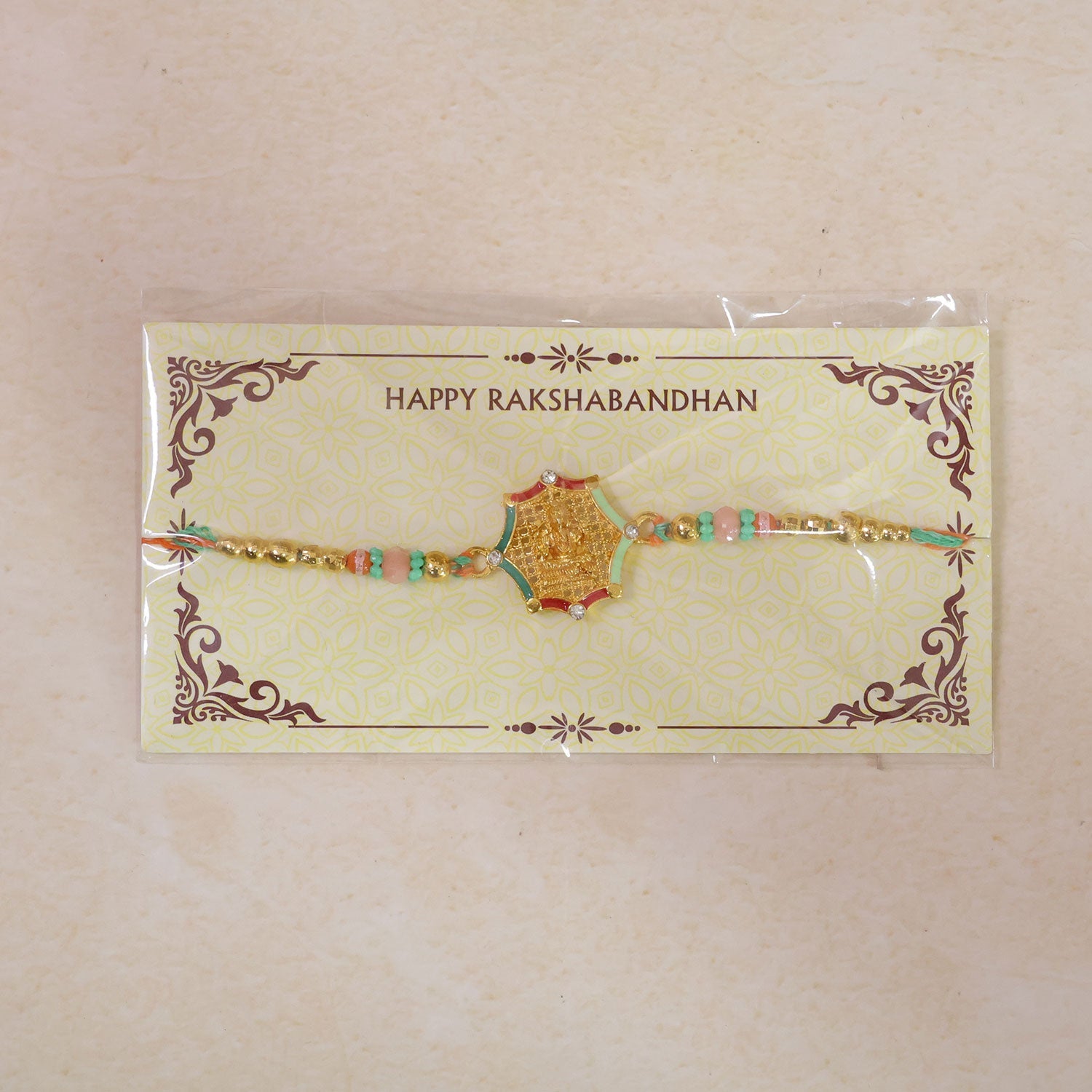 Star Shape Ganesha Designer Rakhi with Beaded Festive Detailing
