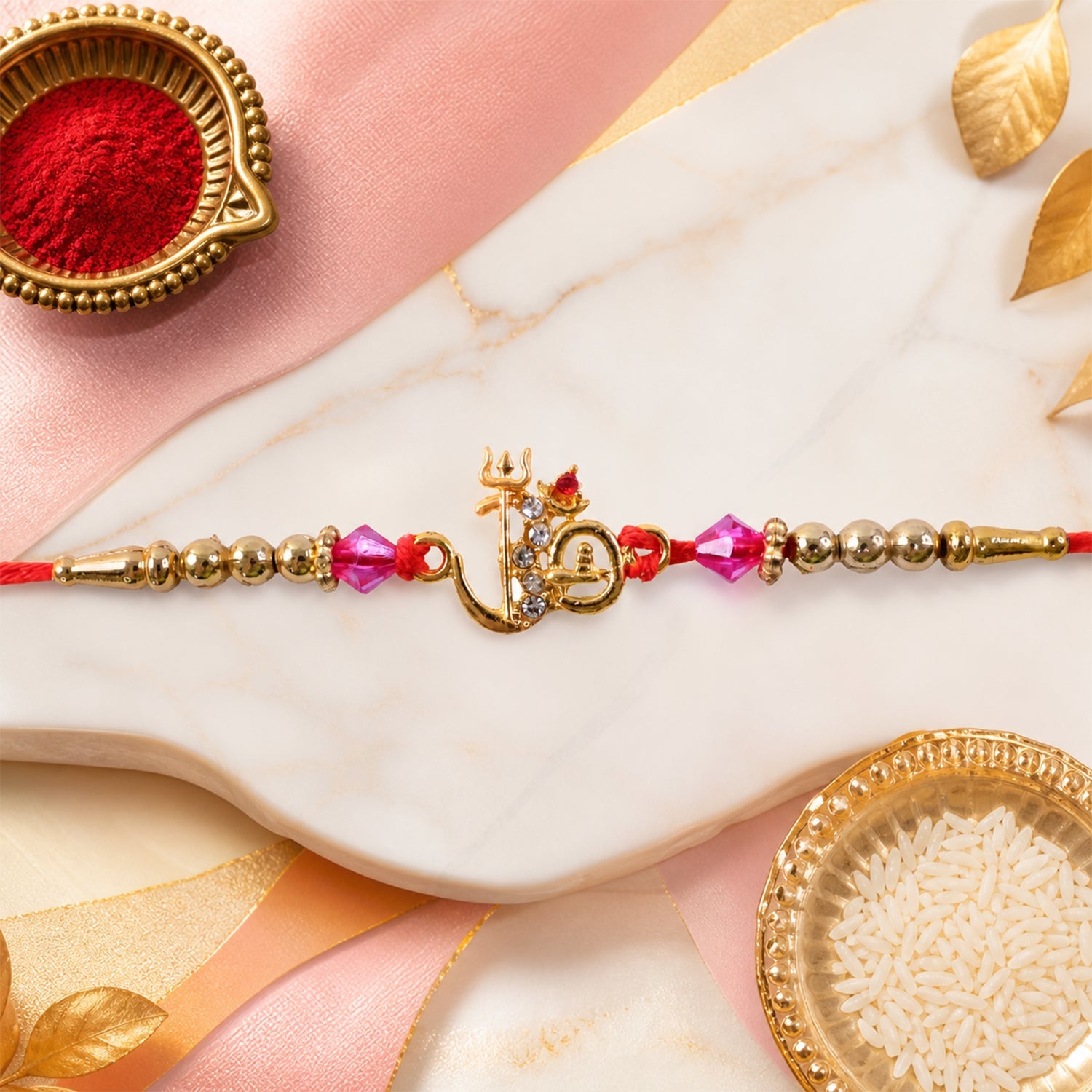 Om Charm Designer Rakhi with Pearl Beaded Traditional Styling